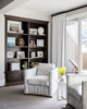 Breakwater in Smoke fabric on dining chairs in a calm, modern interior by Heaton Williams, with views to the garden. Photography by Thomas Kuoh.